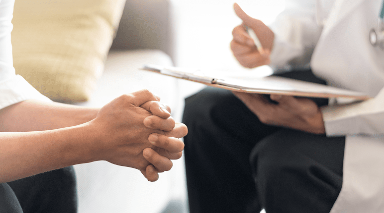 Doctor consulting with patient